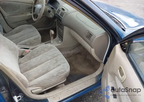 1999 Toyota Corolla Le z USA, uszkodzony, nr VIN 2T1BR12E9XC232710